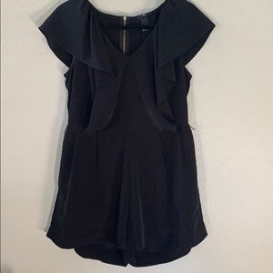 H&M black ruffle front romper. Size 12